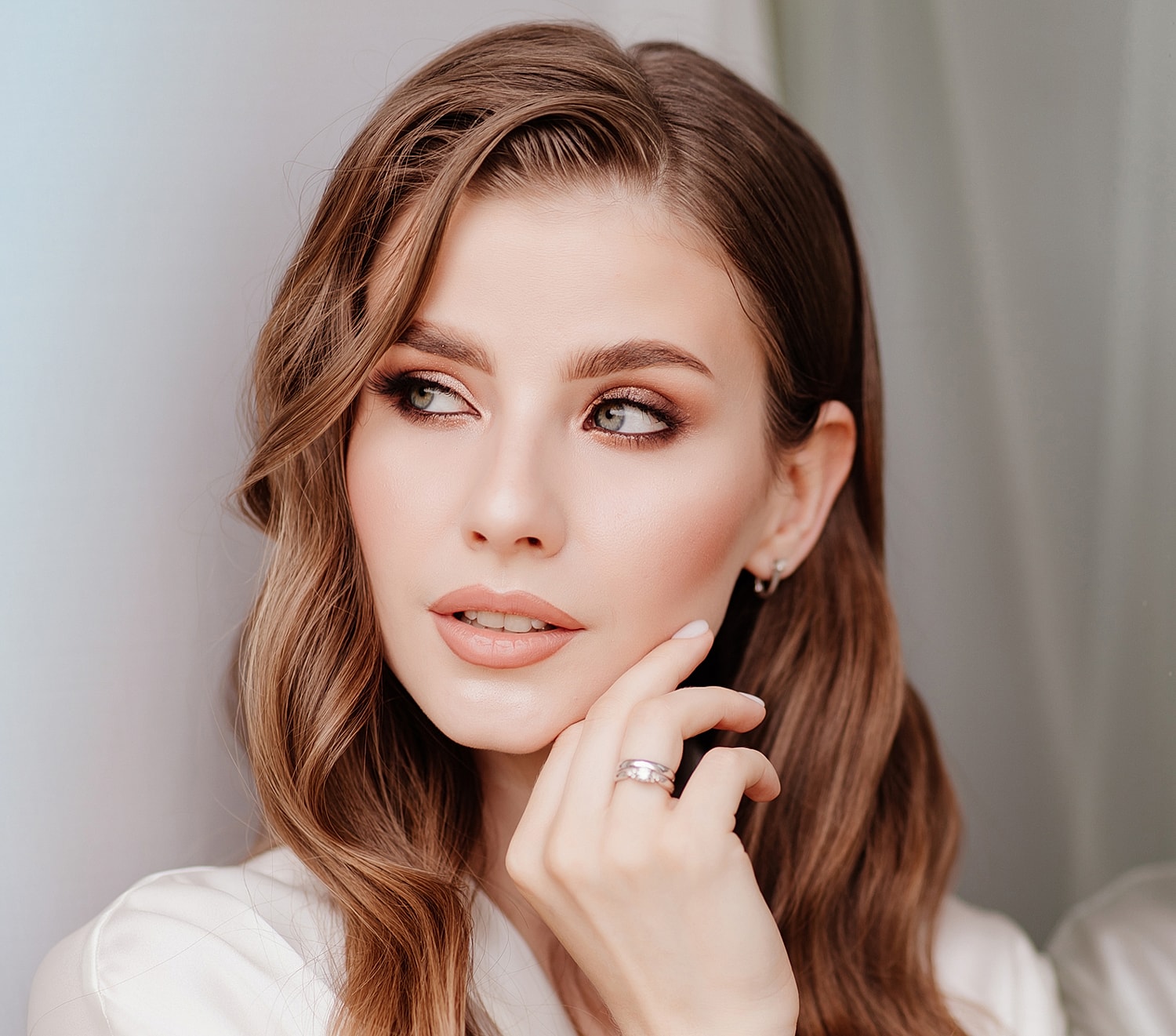 Close-up portrait of a woman with natural makeup.