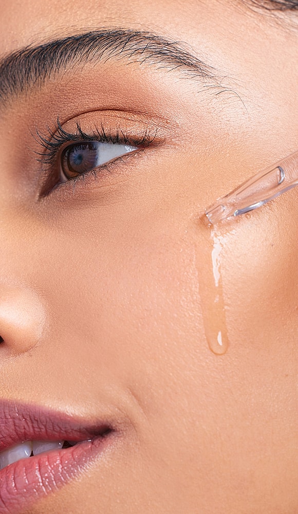 Close-up of skincare application on face.