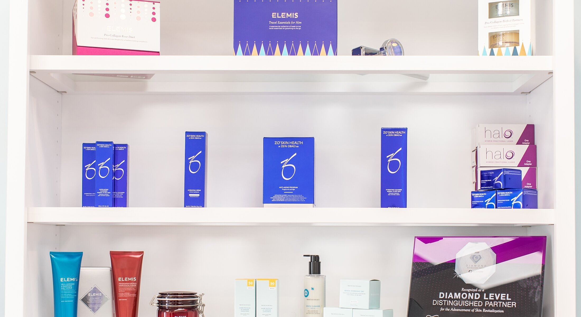 Skincare products on display in organized shelves.